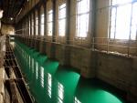 Inside the powerstation, water is fed in to turn turbines