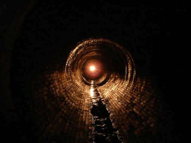 Cool pic in a really old tunnel/drain