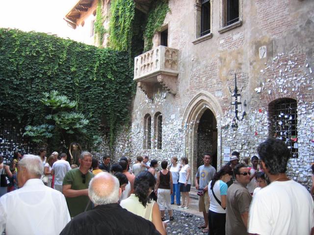 Juliets house in Verona. All the paper on the walls are love notes.